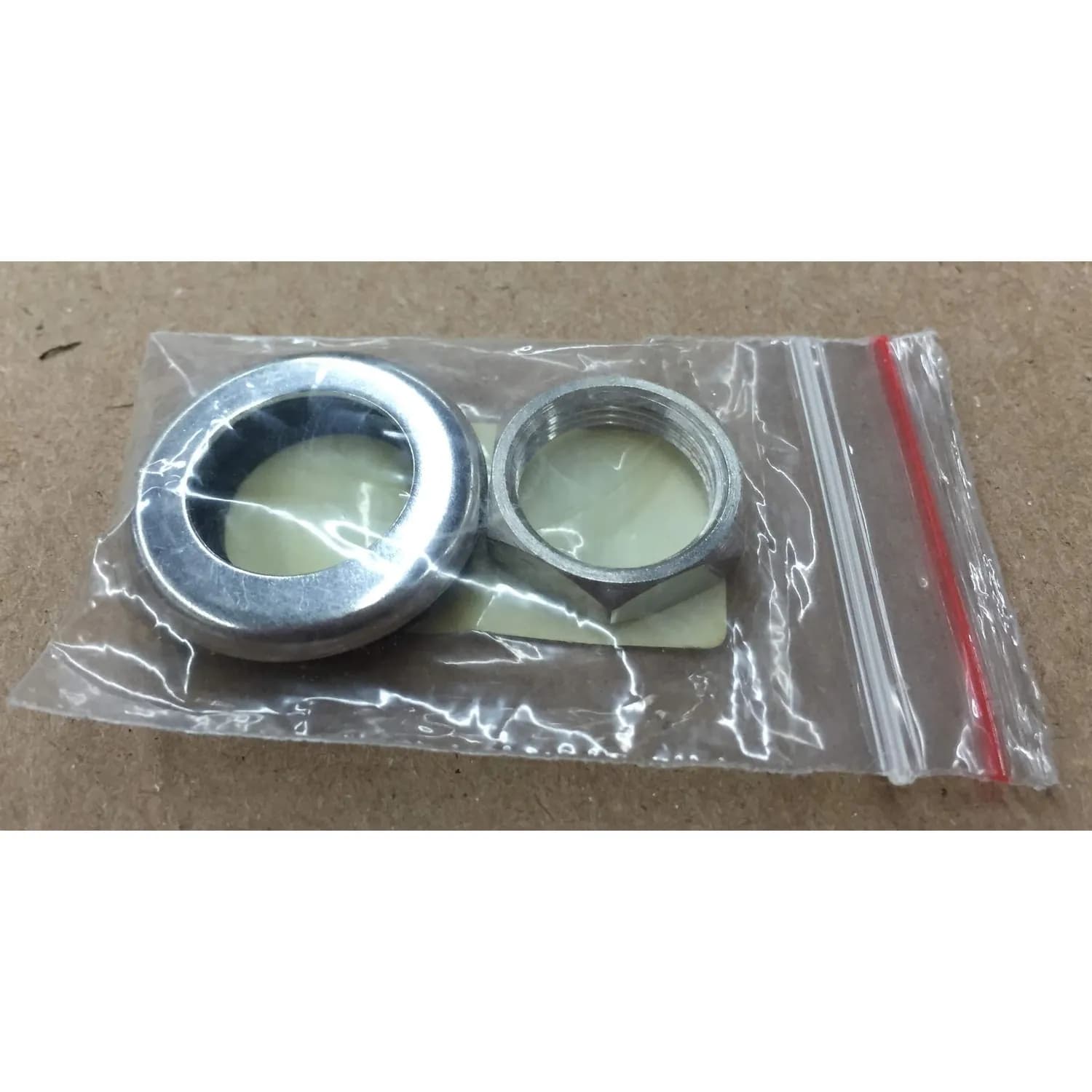W10/W12 Motor Spare Parts Kit: includes mounting nut, washer, and rubber gaskets